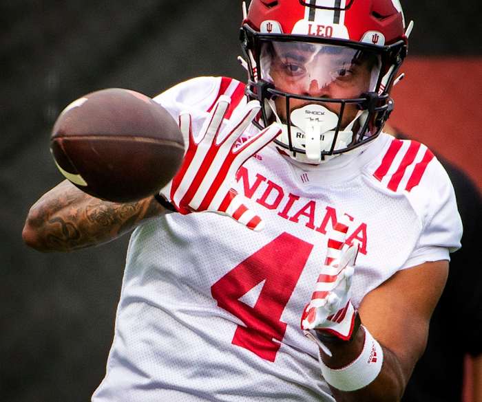 Indiana's DeQuece Carter (4) catches a pass during the first day of fall camp for Indiana football at their practice facilities on Wednesday, Aug. 2, 2023.